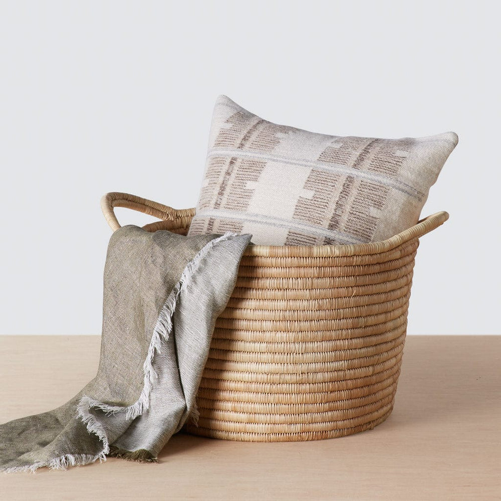 Single woven basket with pillow and throw