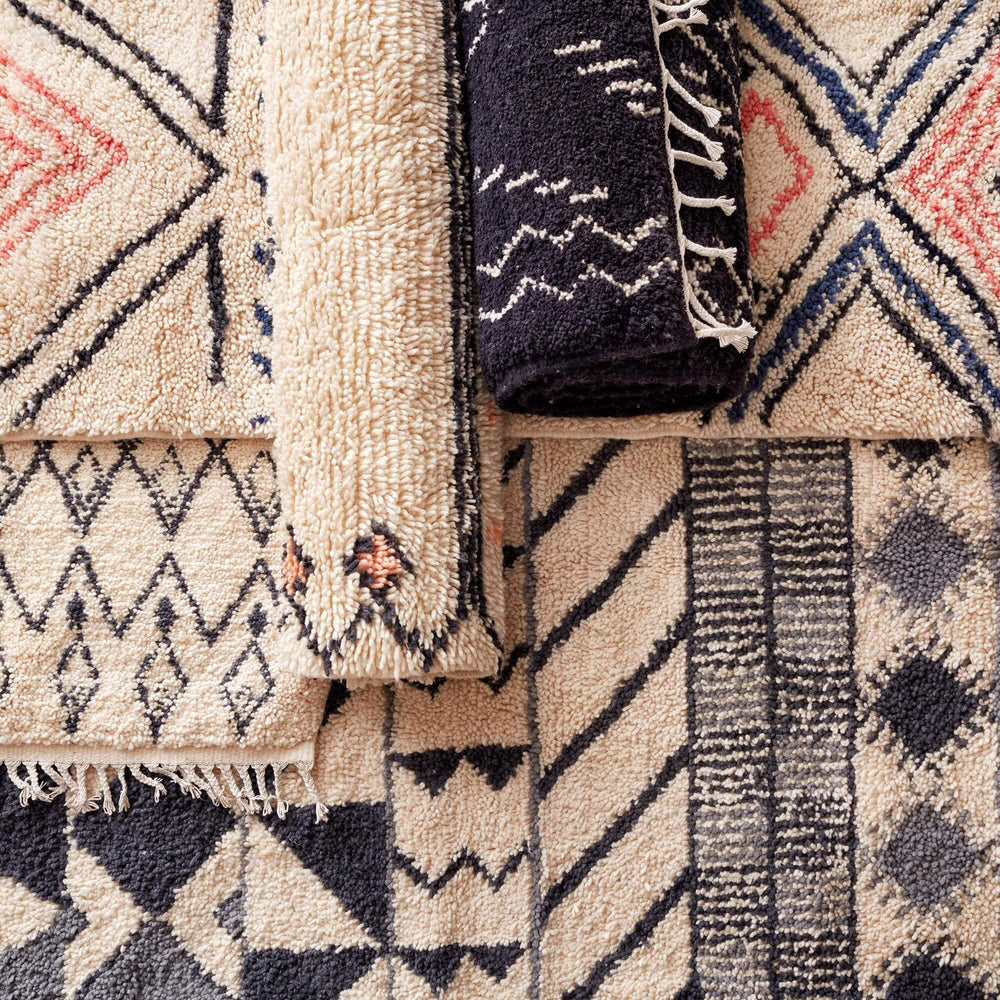 Layered Group of Beni Ourain Rugs