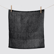 Napkin hanging from clothespins, charcoal