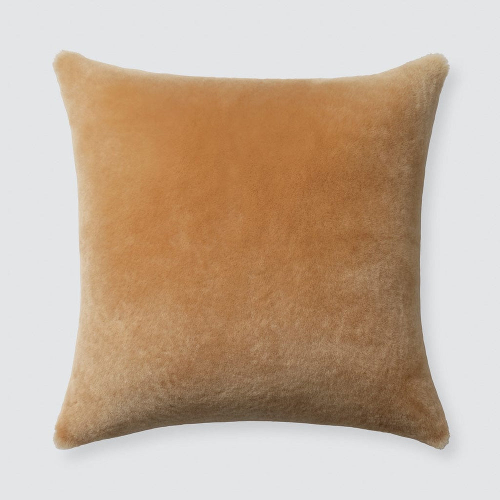 Ethically sourced tan sheepskin pillow from Portugal