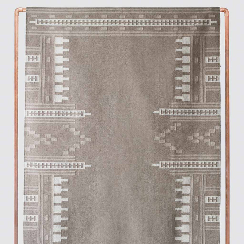 Flax and cream woven patterned area rug, flax