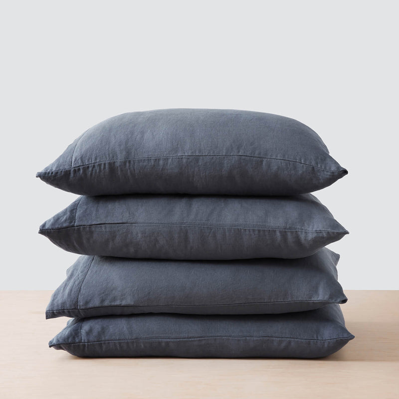 stack of four navy linen pillowcases, slate-blue