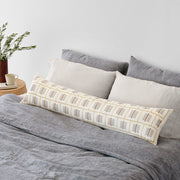 Styled room with indigo chambray and tan linen bedding with lumbar pillow