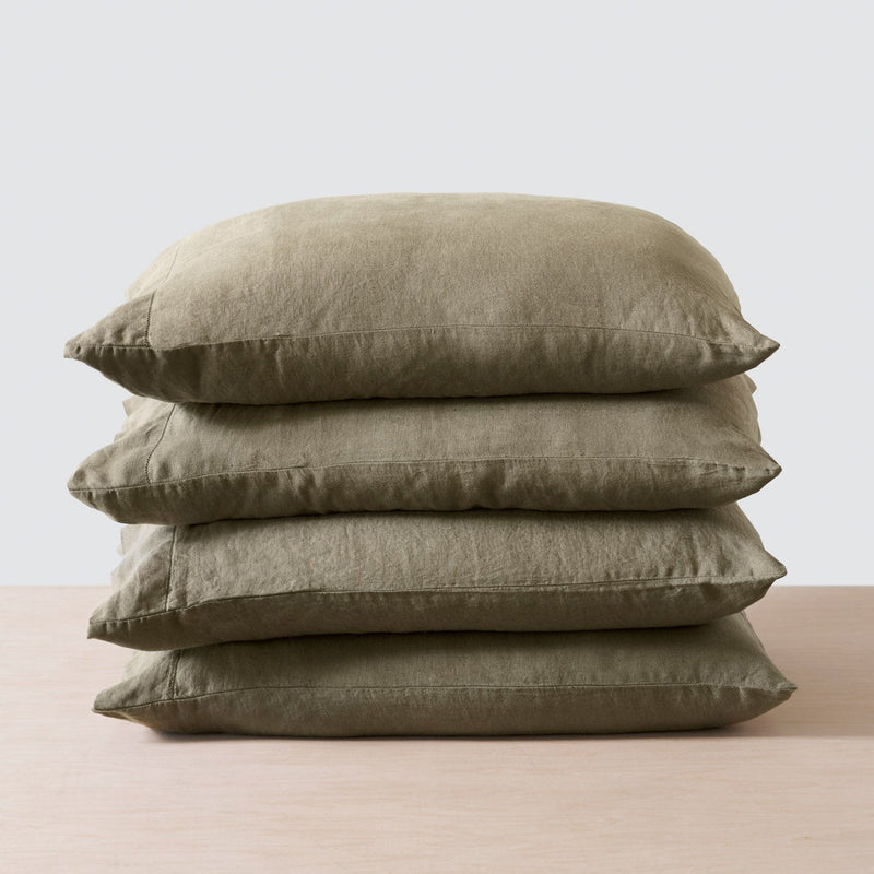 Stack of 4 Pillows with Olive Linen Pillowcases, olive