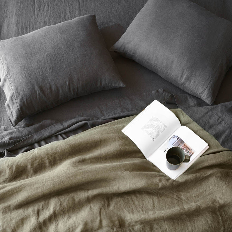 Overhead of Charcoal Linen Sheets and Pillowcases, charcoal