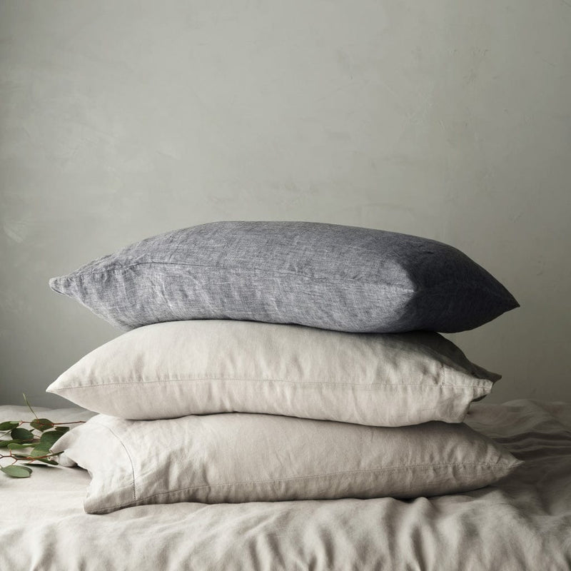 Linen Pillowcase Stack in indigo chambray and sand stripe, solid-sand