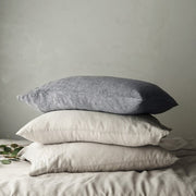 Linen Pillowcase Stack in indigo chambray and sand stripe, solid-sand