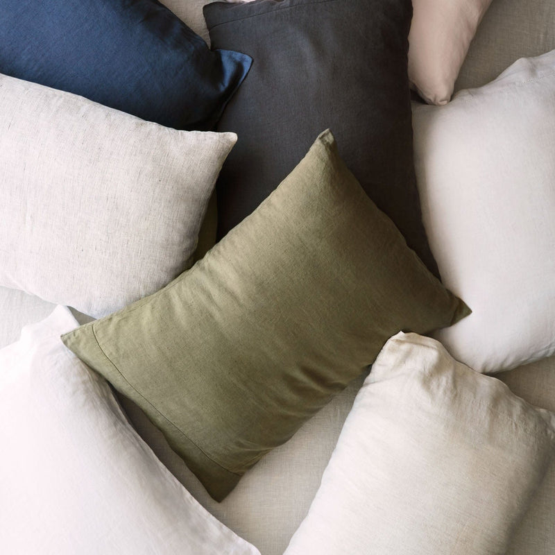 Overhead of Multi-colored Linen Pillows, sand-thin-stripe