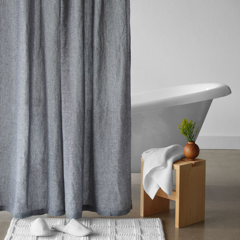 Shower curtain with bath mat and wood stool, indigo-chambray