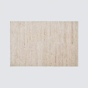Overhead of Suhana textured wool rug in multiple sizes, ecru