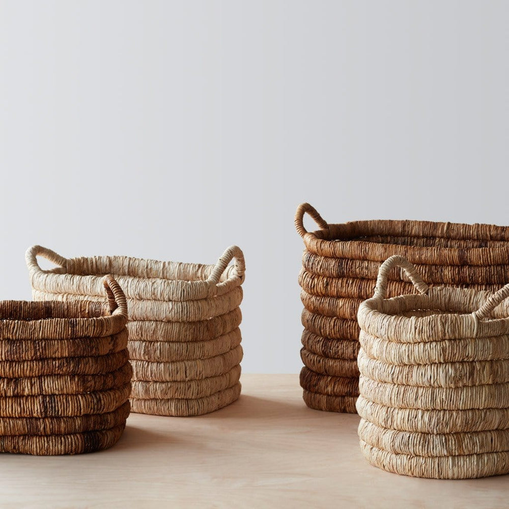 Collection of Handwoven Palm Baskets in Dark and Light Colors