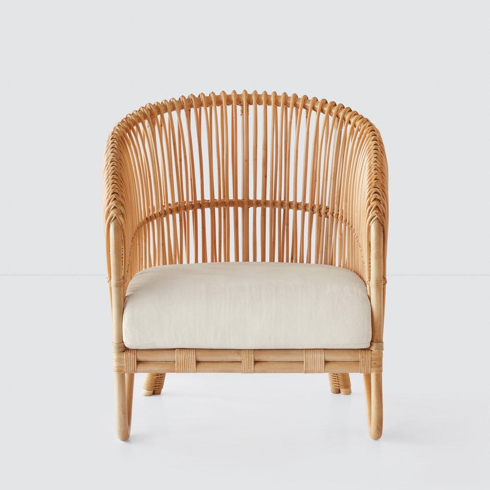 Modern rattan lounge chair with linen cushion