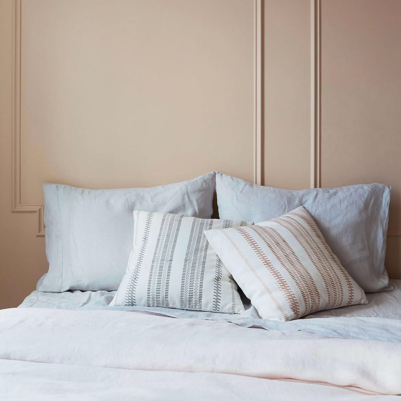 Grey Pillowcases and Blockprint Pillows in Pink Bedroom, light-grey