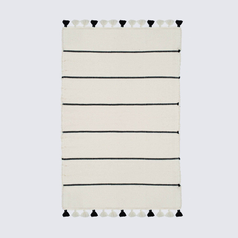 Black striped cotton rug with tassels, ivory-black