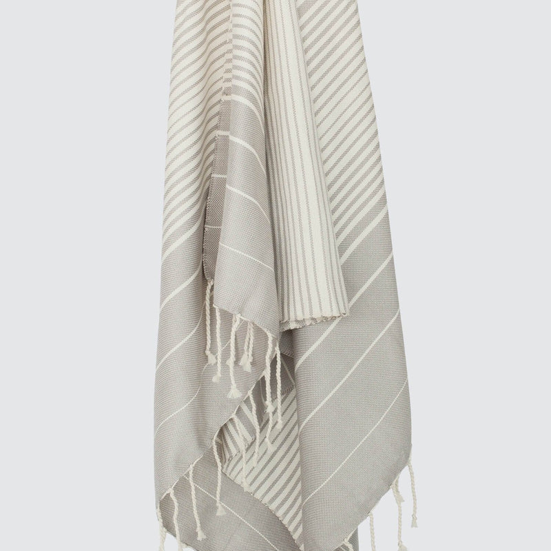 Woven towel with fringe, stone-grey