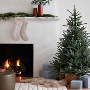 gift boxes in living room under tree