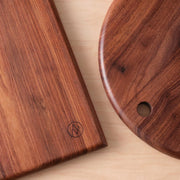 Close up of Citizenry logo on granadillo serving board, granadillo