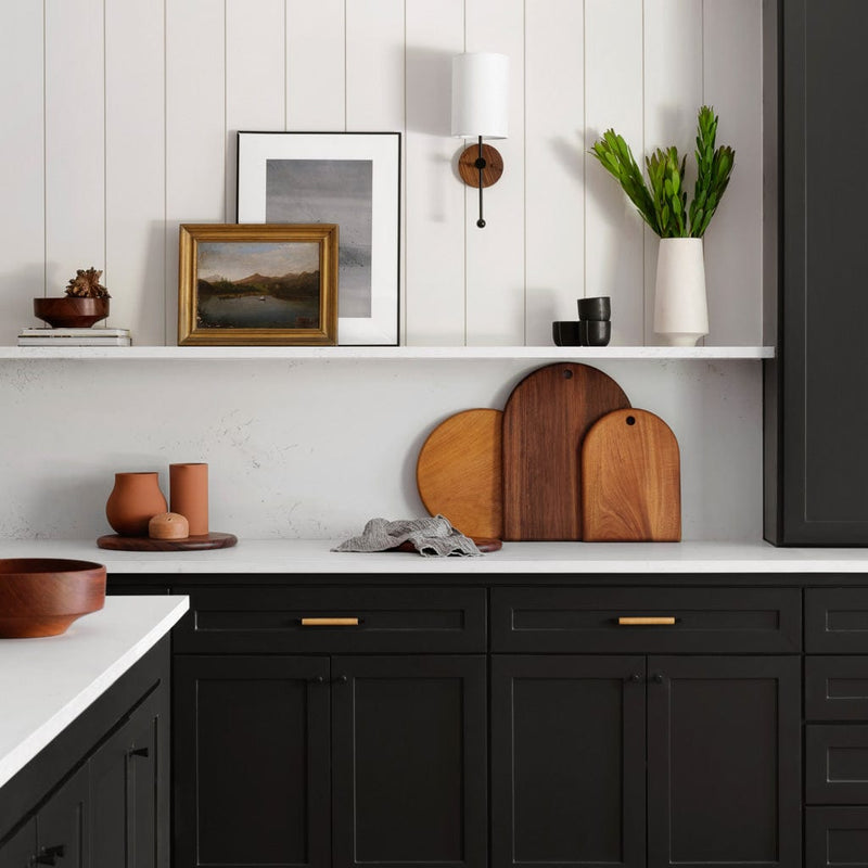 Granadillo and mahogany serving boards on counter in modern farmhouse kitchen, granadillo