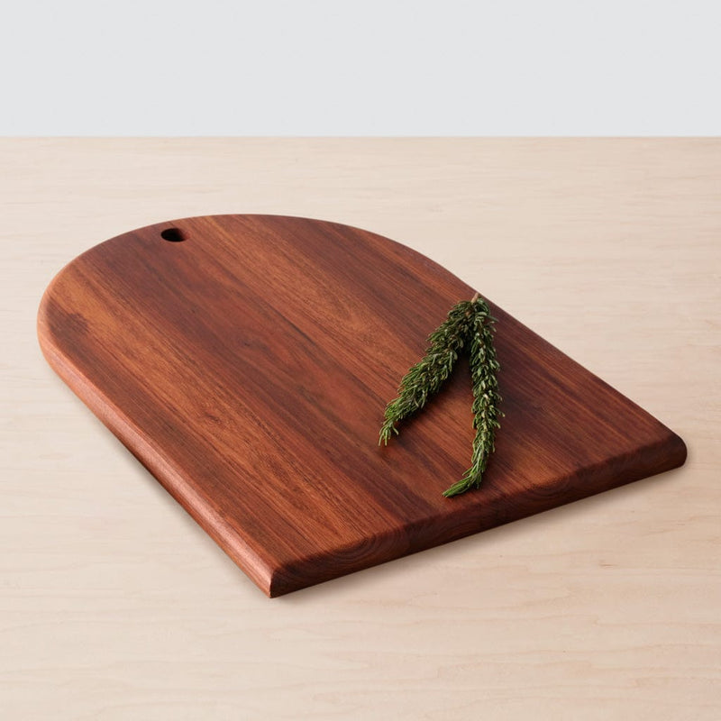 Granadillo wood charcuterie board with greenery, granadillo