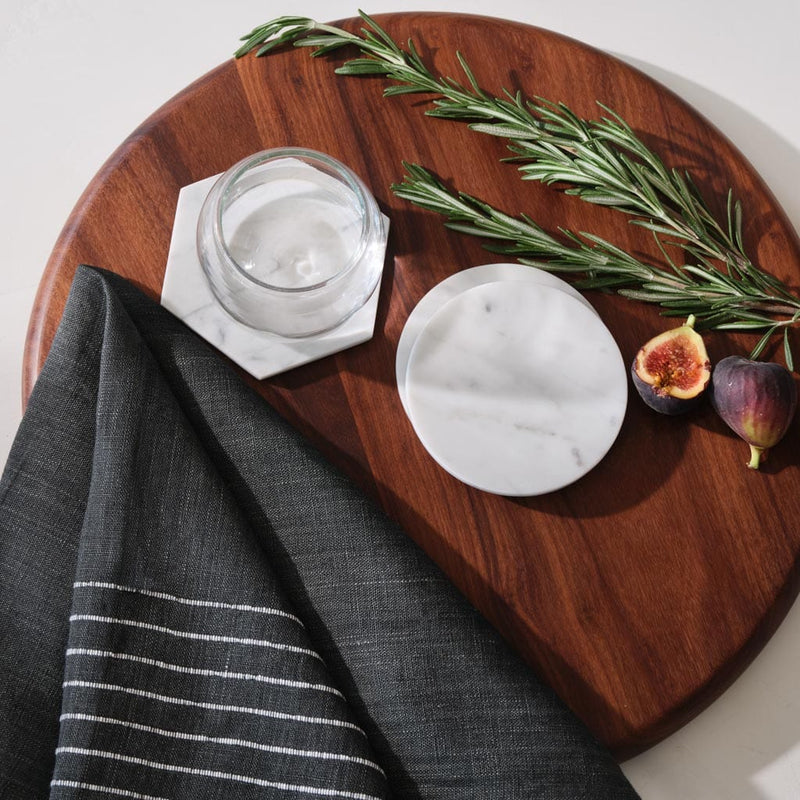 Granadillo wood serving board with linen napkins and marble coasters, granadillo