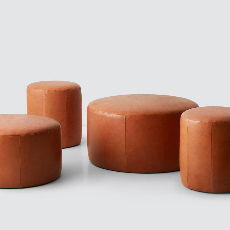 Small and large leather ottomans, caramel
