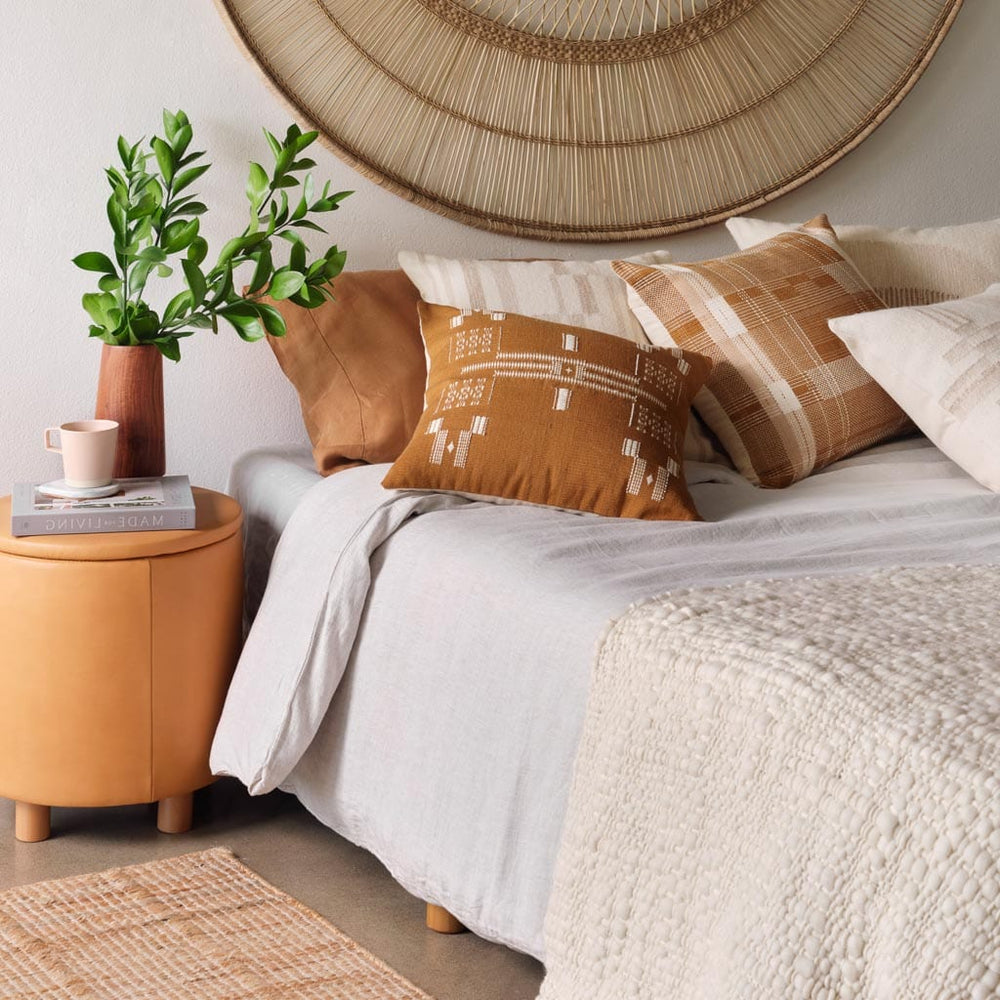 Upholstered Leather Ottomans Poufs Leather Stools at The Citizenry