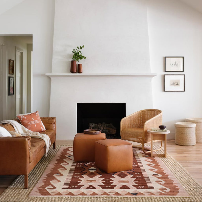 Square leather ottomans in living room, caramel