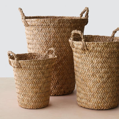 Trio of woven storage baskets