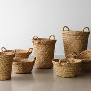 Collection of multiple woven floor and storage baskets