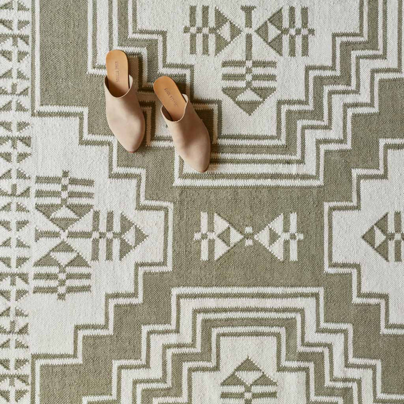 Shoes on flatweave rug, sage