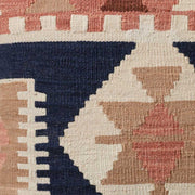 Detail view of pattern on kilim throw pillow, Navy