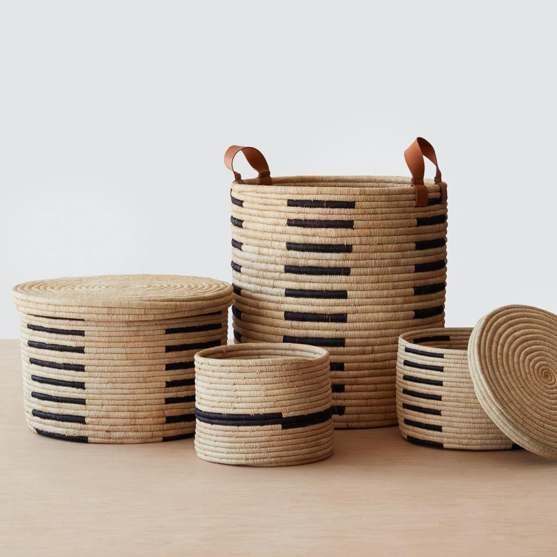 Multiple sizes of handwoven baskets, black-natural